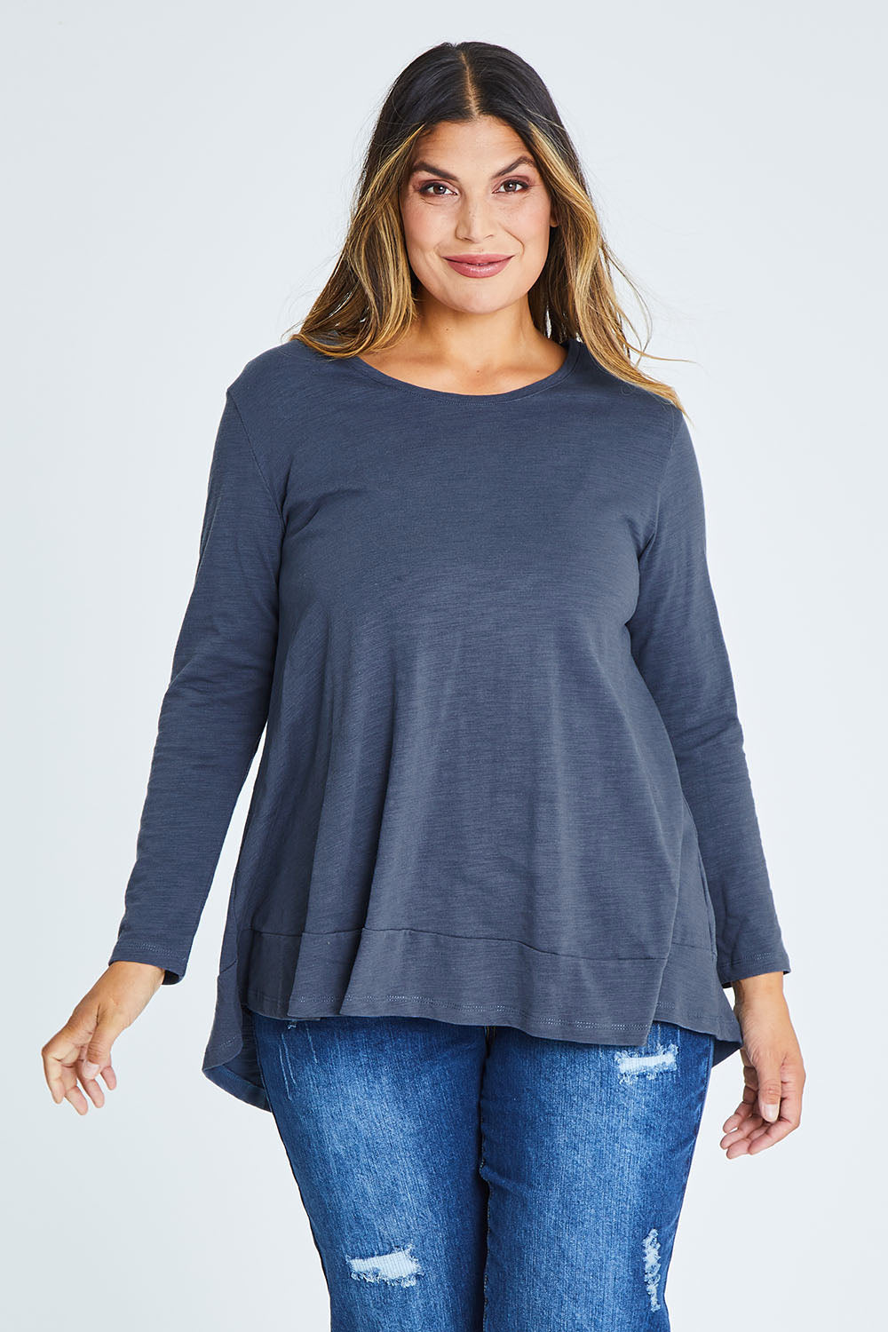 Model Palatina wearing size 16 of The Long Sleeve Swing Tee in colour Slate (Grey), from the front, cropped image