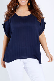 Model Laura wearing size 14 of The Textured Shell Top in colour Navy (Blue), from the front, cropped image