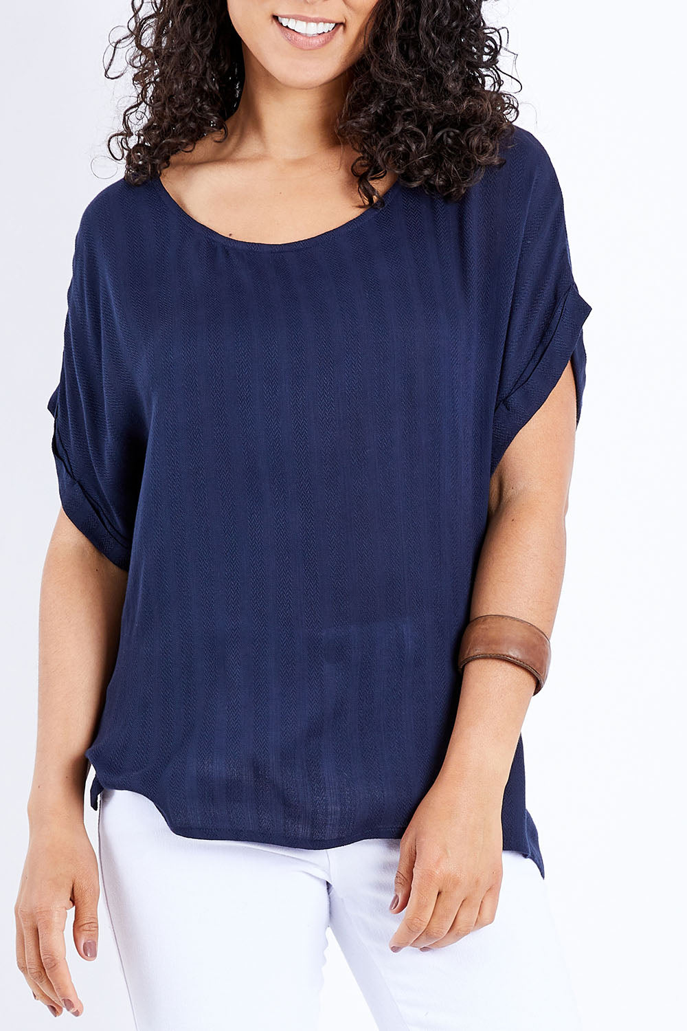 Model Pamela wearing size 10 of The Textured Shell Top in colour Navy (Blue), from the front, cropped image