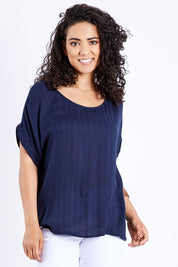 Model Pamela wearing size 10 of The Textured Shell Top in colour Navy (Blue), from the front, cropped image