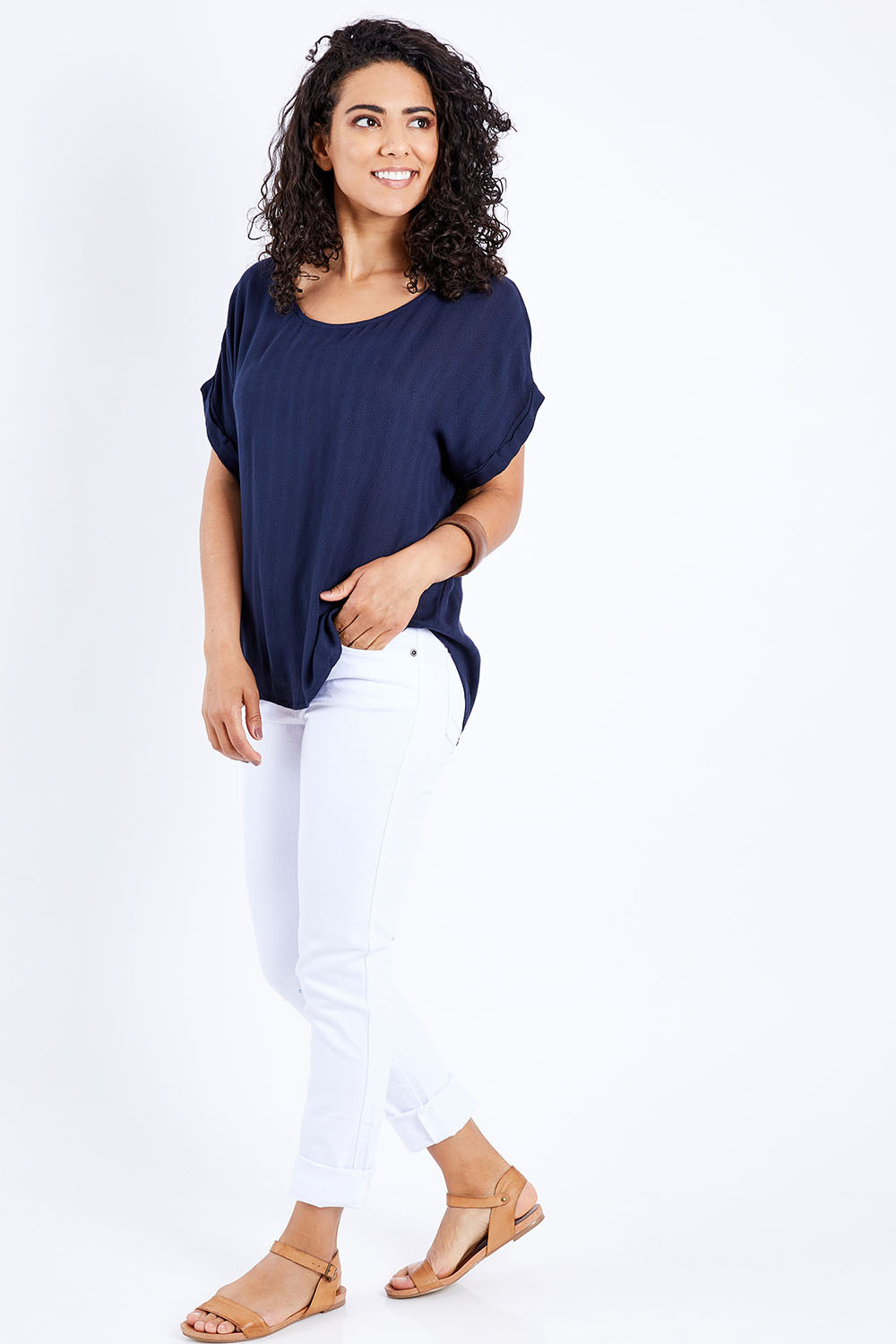 Model Pamela wearing size 10 of The Textured Shell Top in colour Navy (Blue), from the front, showing the whole outfit