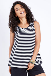 Model Pamela wearing size 10 of The Swing Tank in colour Blkstripe (Black), from the front, cropped image