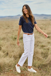 Model Amanda wearing size 10 of The Boyfriend Jean in colour White (White), from the front, showing the whole outfit