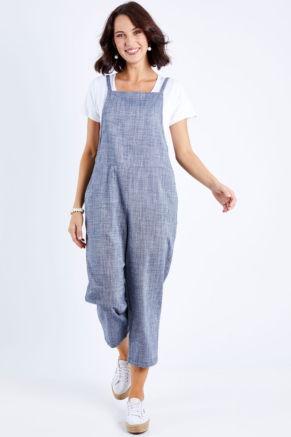 Model Andrea wearing size 10 of The Comfort Overall in colour Bluemarle (Blue), from the front, showing the whole outfit