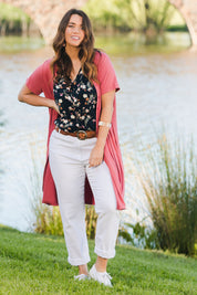 Model Laura wearing size 14 of The Short Sleeve Long Cardi in colour Desertrose (Pink), from the front, showing the whole outfit