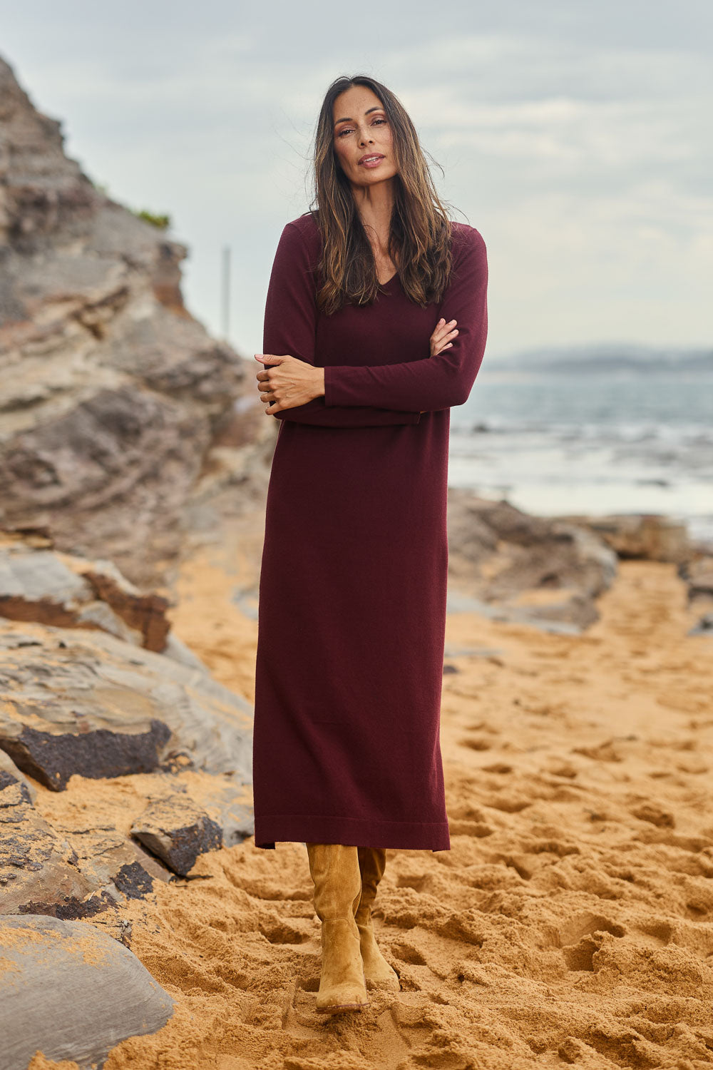 Model Amanda wearing size S of The Comfort True Knit Dress in colour Shiraz (Red), from the front, showing the whole outfit