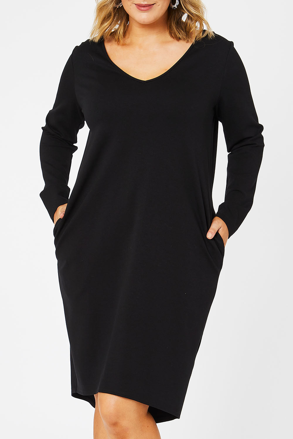 Model Jess wearing size 14 of The V Neck Essential Ponte Dress in colour Black (Black), from the front, cropped image