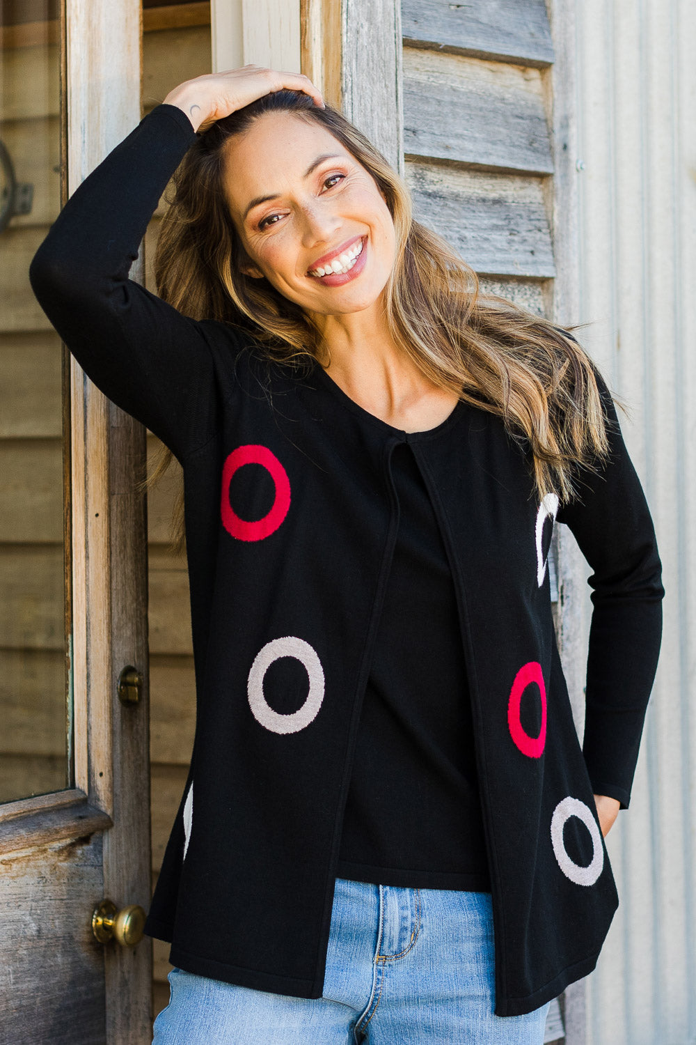 Model Amanda wearing size S of The 2 For Spot Jumper in colour Spot (Black), from the front, showing the whole outfit