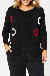 Model Jess wearing size L of The 2 For Spot Jumper in colour Spot (Black), from the front, cropped image