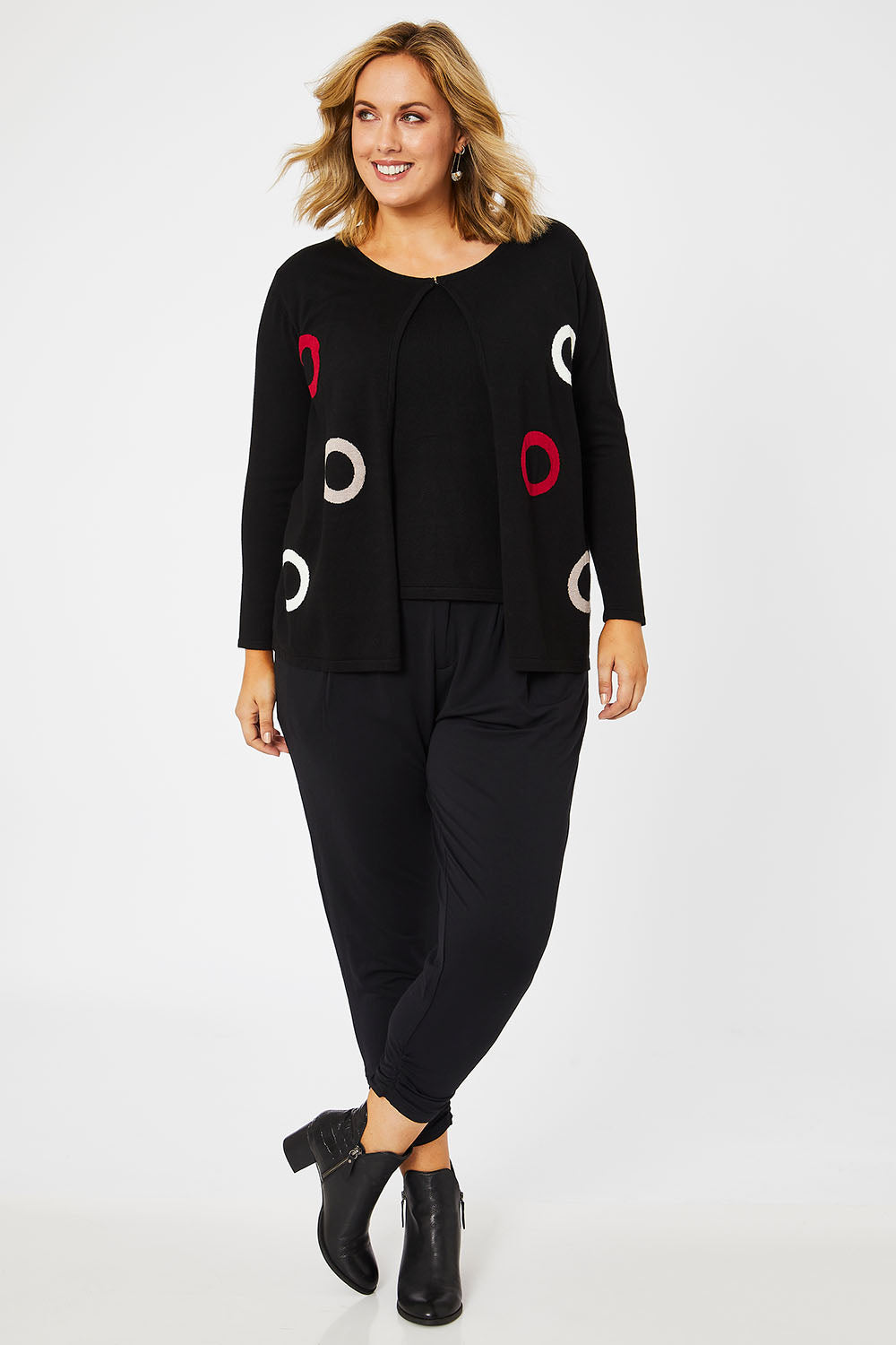 Model Jess wearing size L of The 2 For Spot Jumper in colour Spot (Black), from the front, showing the whole outfit
