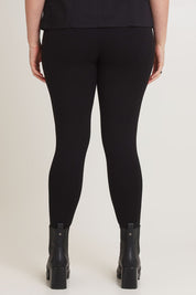Model Chanel wearing size 16 of The Essential Ponte Legging in colour Black (Black), from the back