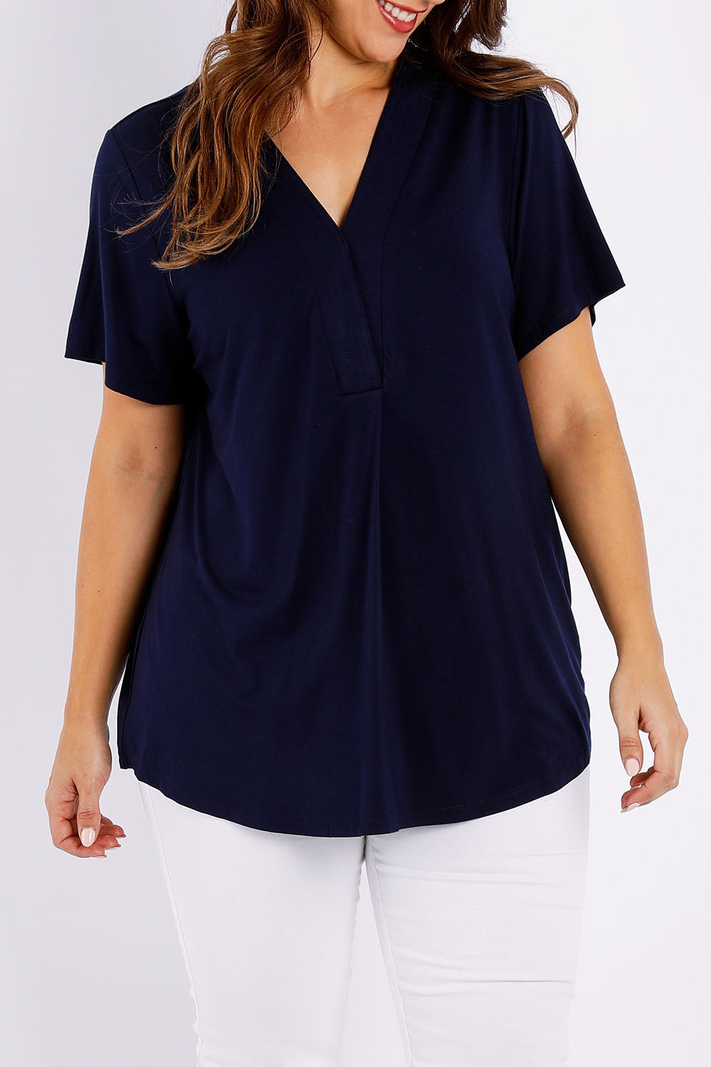 Model Jessica wearing size 14 of The Stitch Detail Short Sleeve Top in colour Navy (Blue), from the front, cropped image