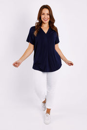 Model Jessica wearing size 14 of The Stitch Detail Short Sleeve Top in colour Navy (Blue), from the front, showing the whole outfit