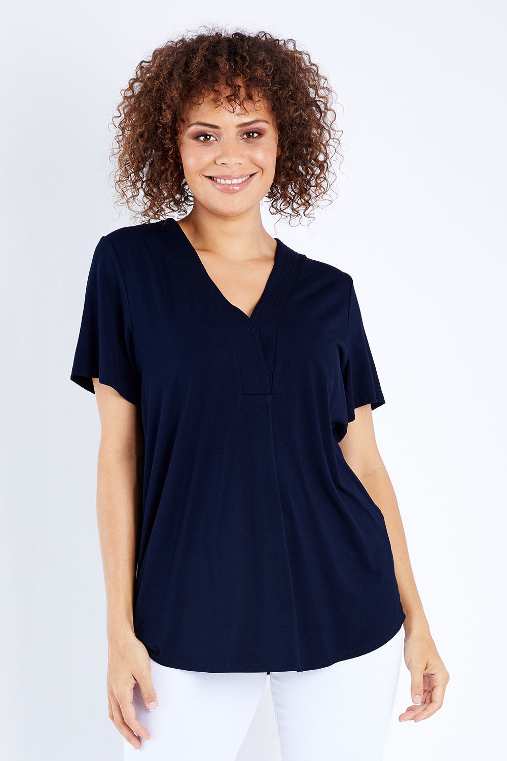 Model Lala wearing size 10 of The Stitch Detail Short Sleeve Top in colour Navy (Blue), from the front, cropped image