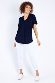 Model Lala wearing size 10 of The Stitch Detail Short Sleeve Top in colour Navy (Blue), from the front, showing the whole outfit