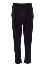 Product shot of The Recycled Flat Front Pull On Pant in colour Black (Black), from the back