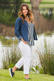 Model Laura wearing size 14 of The Collarless Denim Panel Jacket in colour Denimblue (Blue), from the front, showing the whole outfit