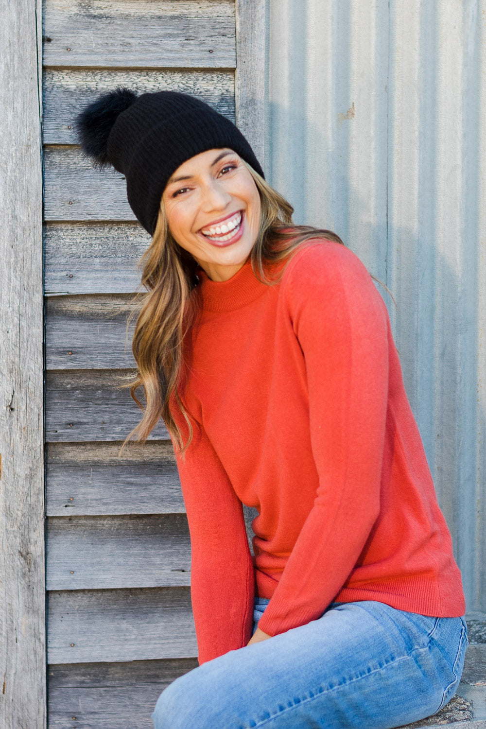 Model Amanda wearing size S of The Essential Soft Jumper in colour Ginger, from the front, showing the whole outfit