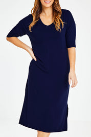 Model Laura wearing size 14 of The 3/4 Sleeve Mid Length Tee Dress in colour Navy (Blue), from the front, cropped image
