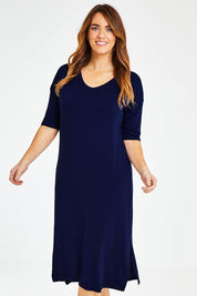 Model Laura wearing size 14 of The 3/4 Sleeve Mid Length Tee Dress in colour Navy (Blue), from the front, cropped image