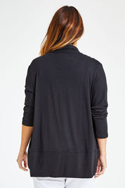 Model Laura wearing size 14 of The Draped Edge To Edge Cardigan in colour Black (Black), from the back