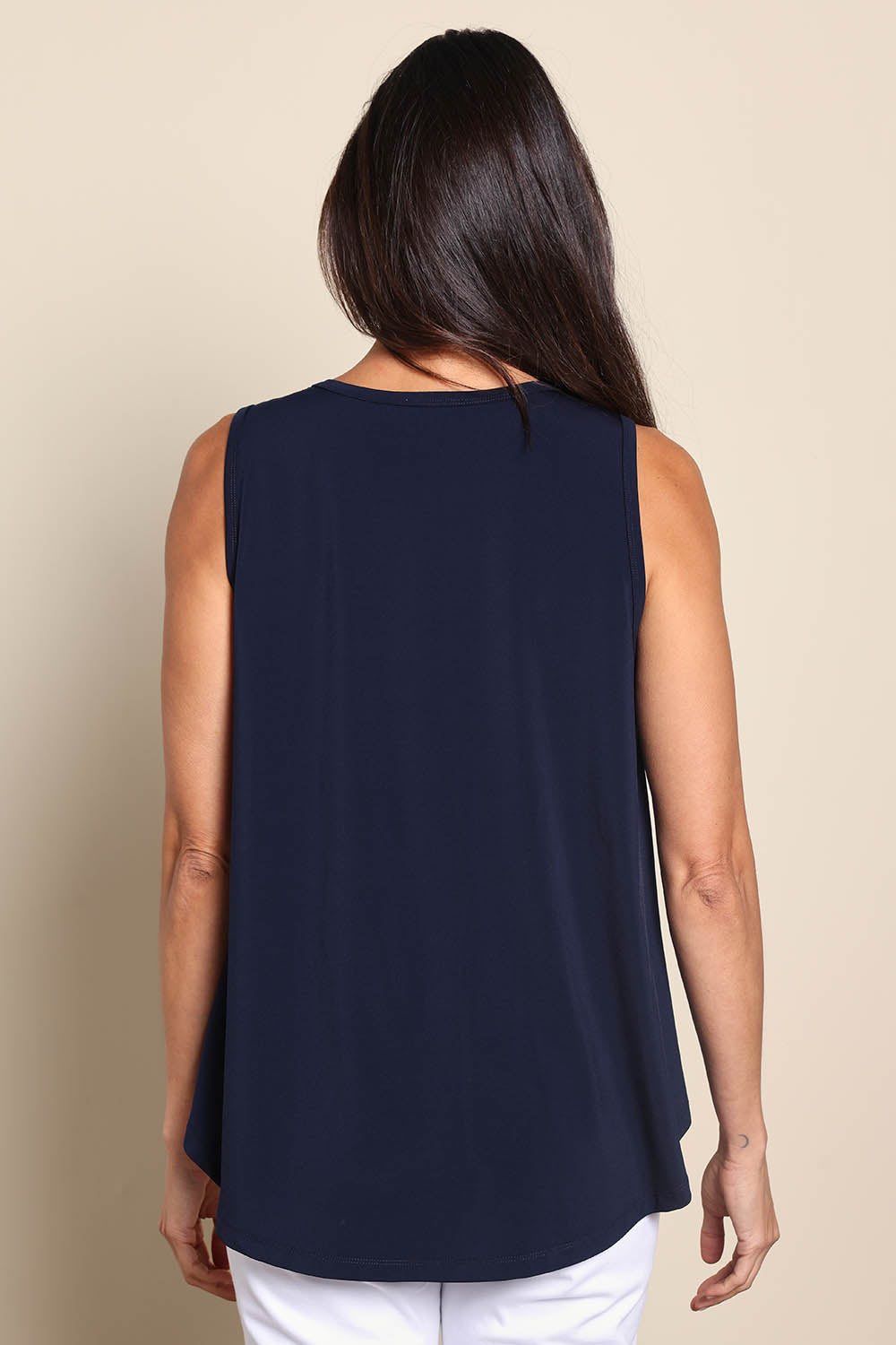 Model Amandam wearing size 10 of the The Essential Swing Tank – Navy in colour Navy, from the back