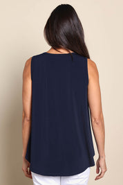 Model Amandam wearing size 10 of the The Essential Swing Tank – Navy in colour Navy, from the back