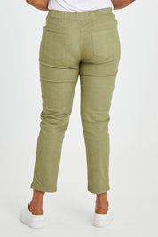 Model Noli wearing size 14 of The 7/8 Pull On Pant in colour Olive (Green), from the back