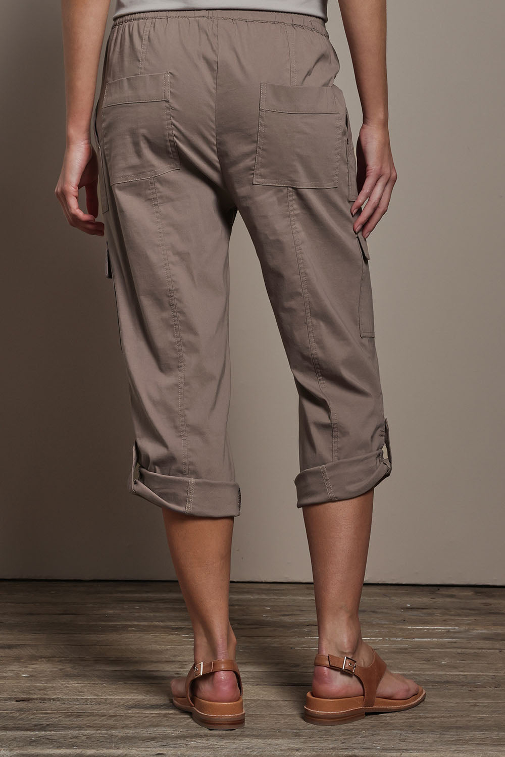 Model Madeline wearing size 10 of The Cotton Blend Cargo Pant in colour Coffee, from the back