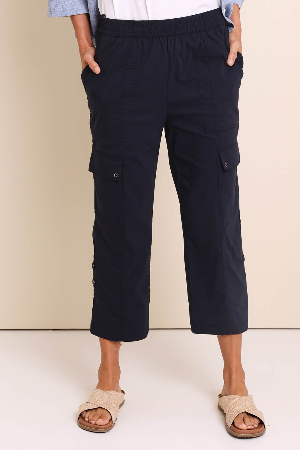 Model Amandam wearing size 10 of the The Cotton Blend Cargo Pant - Navy in colour Navy, in a cropped view