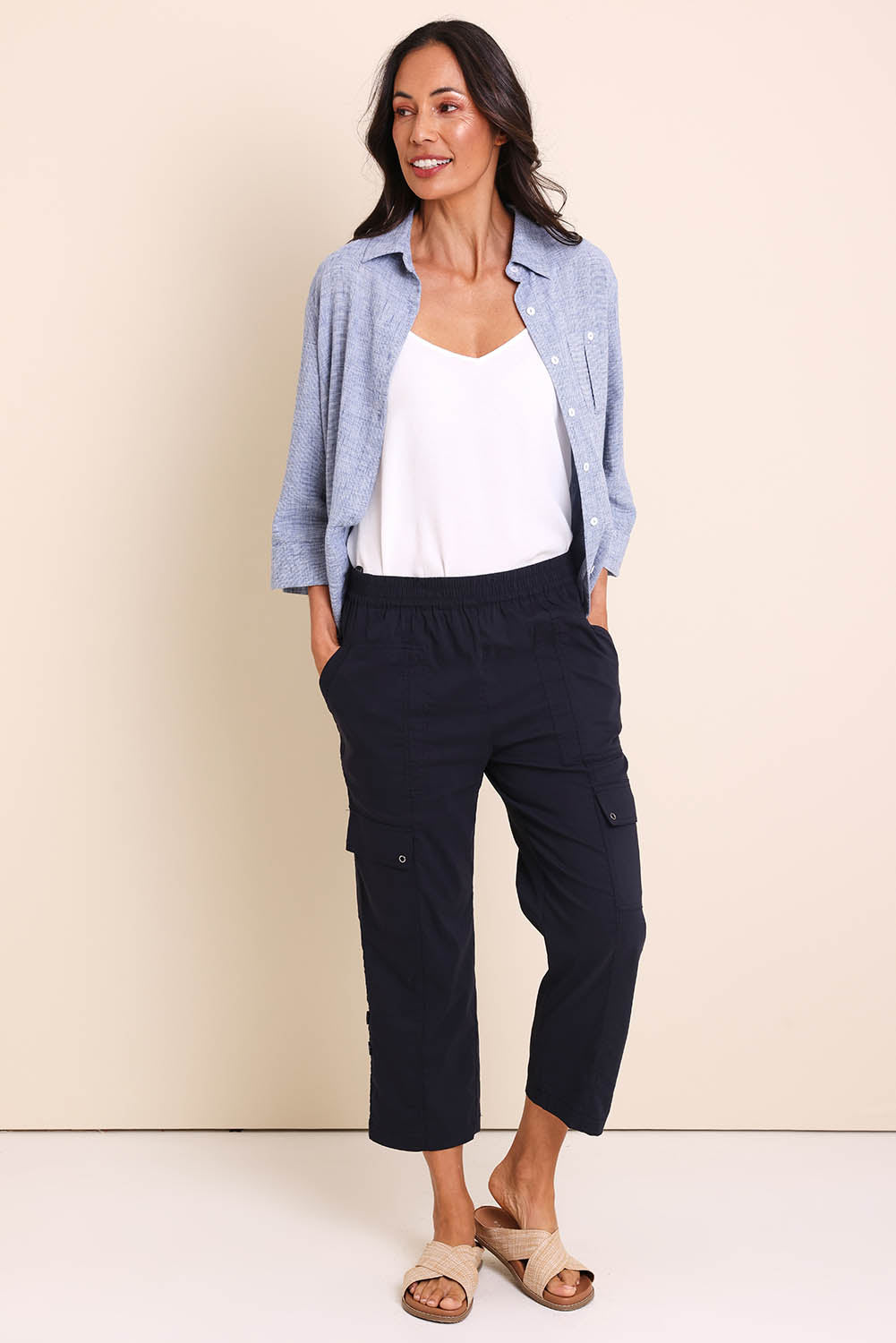 Model Amandam wearing size 10 of the The Cotton Blend Cargo Pant - Navy in colour Navy, from the front
