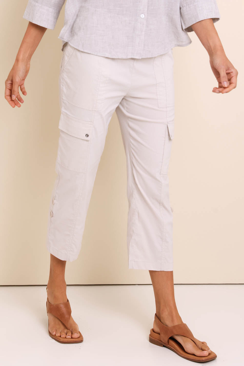 Model Amandam wearing size 10 of the The Lightweight Cotton Blend Cargo Pant – Pummice in colour Pummice, in a cropped view