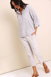 Model Amandam wearing size 10 of the The Lightweight Cotton Blend Cargo Pant – Pummice in colour Pummice, from the front