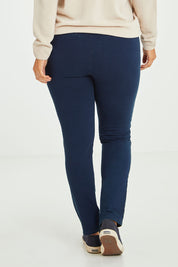 Model Laura wearing size 14 of The Leisure Pull On Pant in colour Navy (Blue), from the back