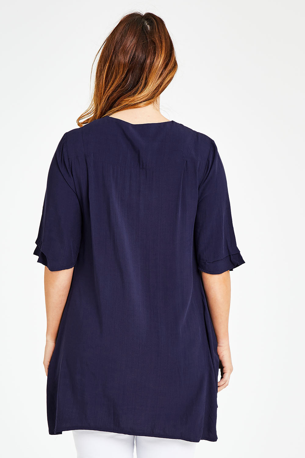 Model Laura wearing size 14 of The Tie Detail 2 For Top in colour Navy (Blue), from the back