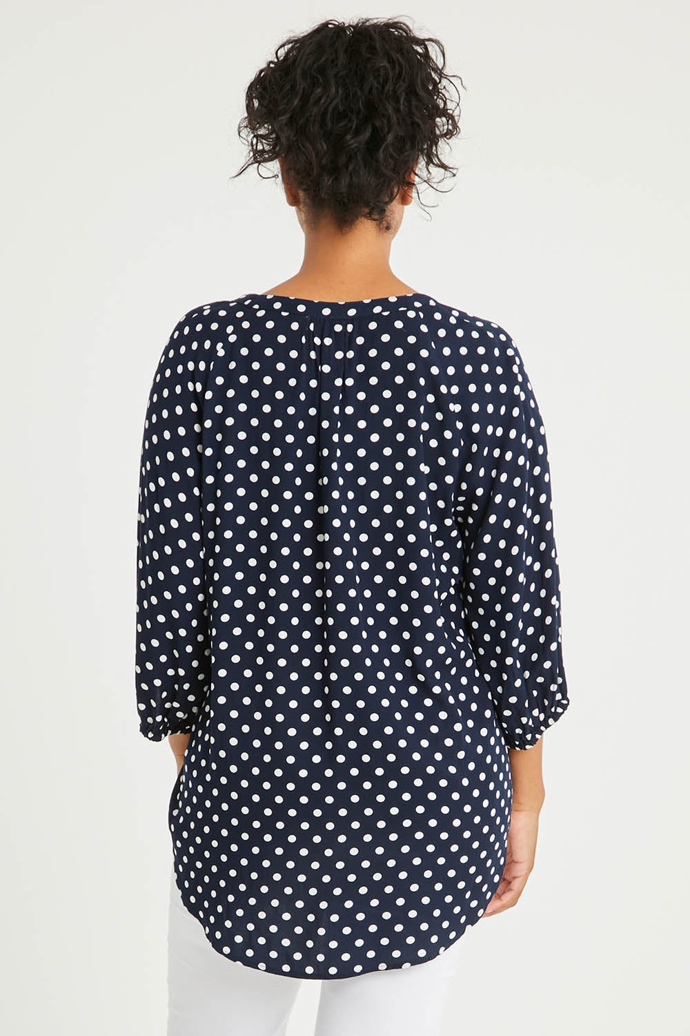 Model Noli wearing size 14 of The Perfect Relaxed Fit Shirt in colour Navyspot (Blue), from the back