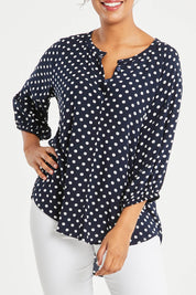 Model Noli wearing size 14 of The Perfect Relaxed Fit Shirt in colour Navyspot (Blue), from the front, cropped image