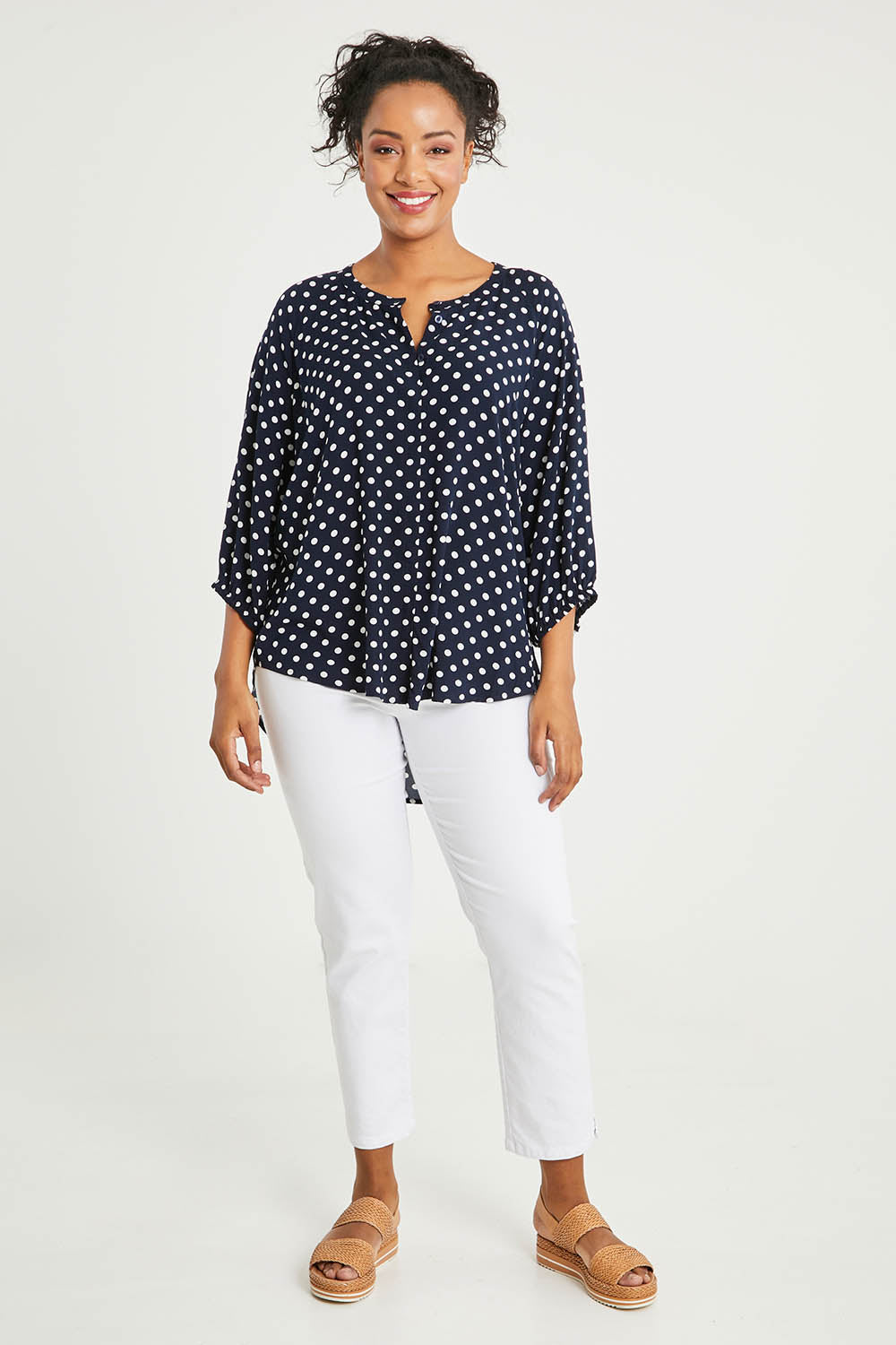 Model Noli wearing size 14 of The Perfect Relaxed Fit Shirt in colour Navyspot (Blue), from the front, showing the whole outfit