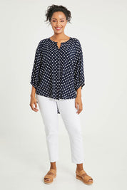 Model Noli wearing size 14 of The Perfect Relaxed Fit Shirt in colour Navyspot (Blue), from the front, showing the whole outfit
