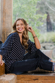 Model Tahlia wearing size 10 of The Perfect Relaxed Fit Shirt in colour Navyspot (Blue), from the front, showing the whole outfit