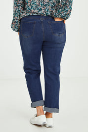 Model Laura wearing size 14 of The Keepers Highwaisted Straight Jean in colour Darkdenim (Blue), from the back