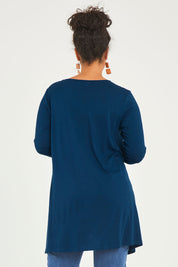 Model Noli wearing size 14 of The Crew Neck High Low Tunic in colour Deeplagoon (Blue), from the back
