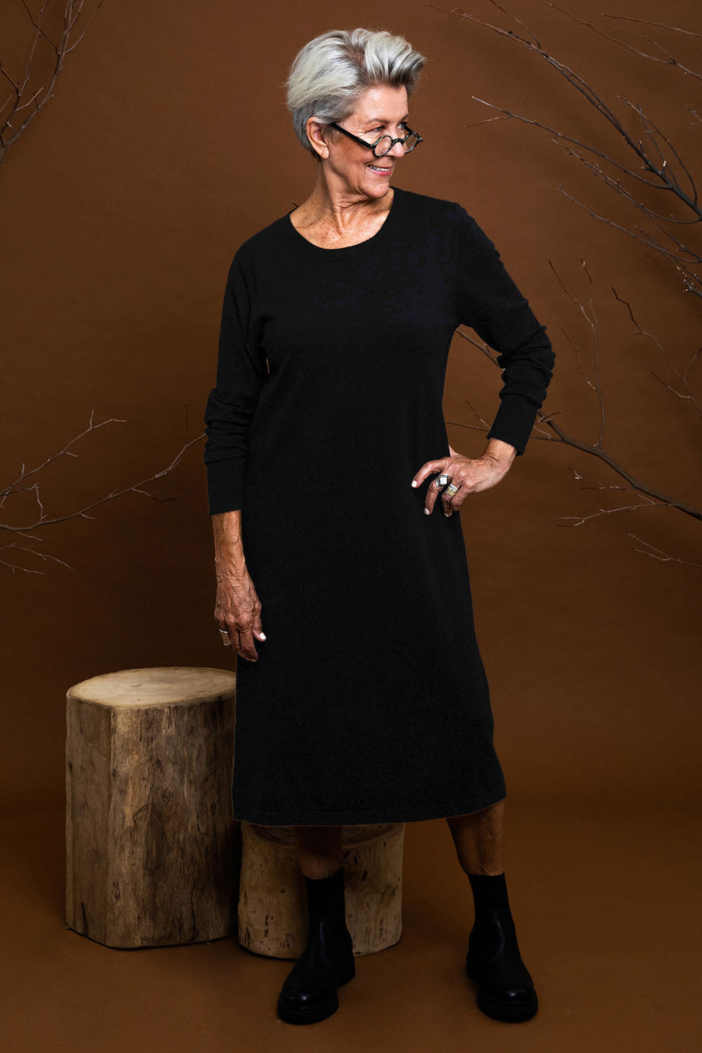 Model Elise wearing size S of The Everyday Knit Midi Dress in colour Black (Black), from the front, showing the whole outfit