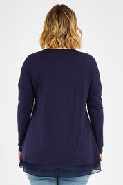 Model Jess wearing size 14 of The Chiffon Underlay Layered Tee in colour Darknavy (Blue), from the back