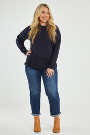 Model Katie wearing size 16 of The Rib Trim Long Sleeve Tee in colour Navy (Blue), from the front, showing the whole outfit