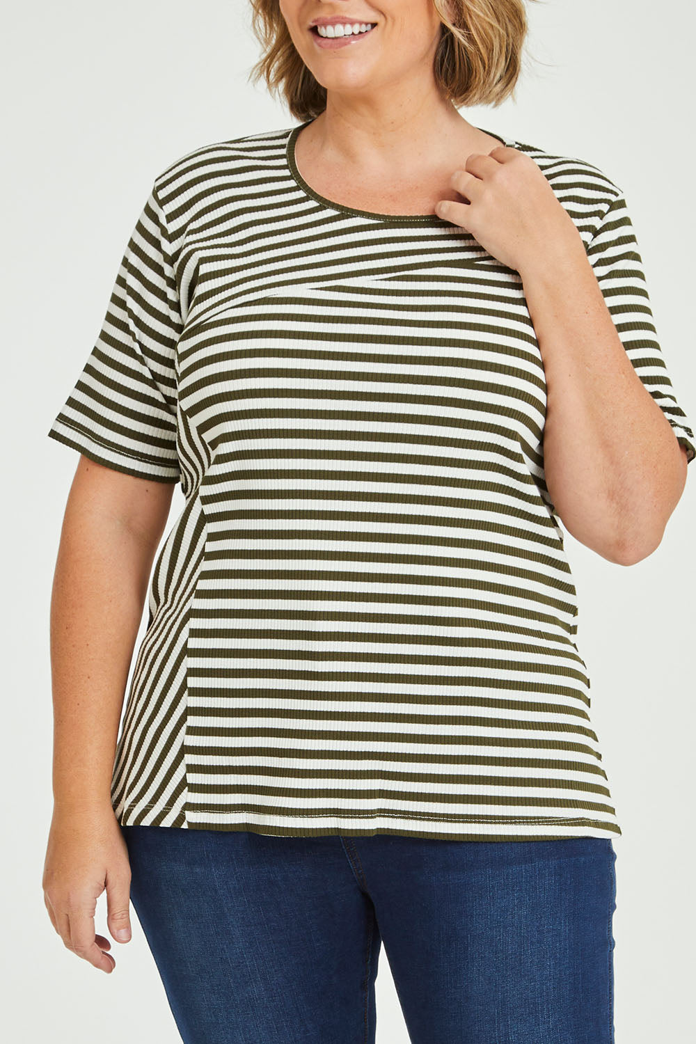 Model Fiona wearing size 16 of The Spliced Stripe Tee in colour Olive (Green), from the front, cropped image