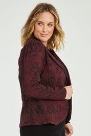Model Jess wearing size 14 of The Jacquard Ponti Jacket in colour Burgundy (Red), from the front, cropped image