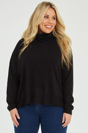 Model Katie wearing size XL of The Essential Soft High Low Jumper in colour Black (Black), from the front, cropped image