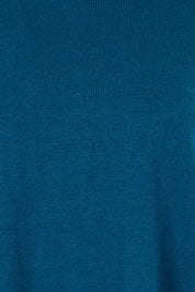 Product shot of The Essential Soft High Low Jumper in colour Petrol (Blue), detail