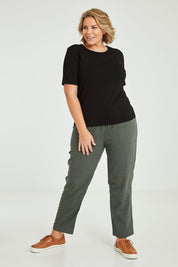 Model Fiona wearing size 16 of The Keepers Tee in colour Black (Black), from the front, showing the whole outfit
